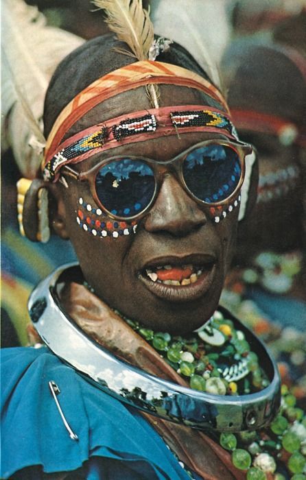 A Kikuyu tribesman dresses up for a festival in Kenya