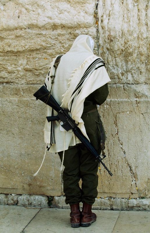 Israeli Soldier With Rifle Praying