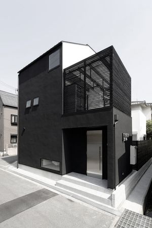 black house with stainless steel door