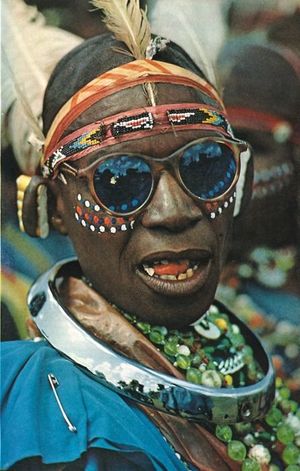 A Kikuyu tribesman dresses up for a festival in Kenya