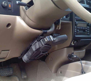 Steering wheel mounted holster